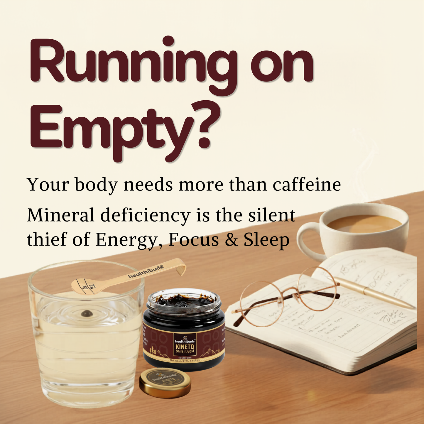 A lifestyle promotional graphic for SINTO Energy & Sleep supplement. The scene shows a glass of water with a spoon, an open jar of SINTO supplement with its lid off, an open notebook with glasses on top, and a cup of coffee on a wooden desk, under the headline 'Running on Empty?'.