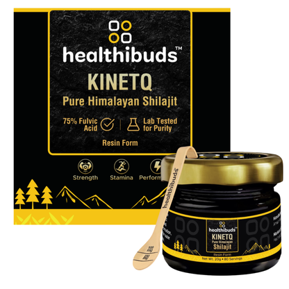 A jar of healthibuds Kinetq Pure Himalayan Shilajit resin with a wooden scoop, shown in front of its black and yellow packaging box.