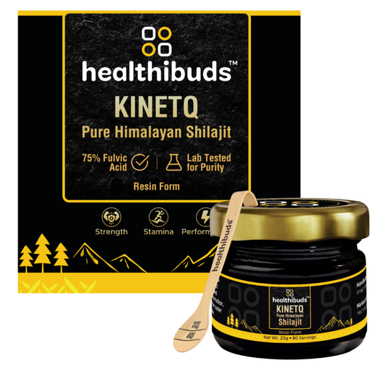 A jar of healthibuds Kinetq Pure Himalayan Shilajit resin with a wooden scoop, shown in front of its black and yellow packaging box.